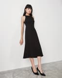 Đầm thun lửng cổ yếm dây nơ thân sau