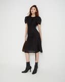 Đầm lửng rút nhún tay phồng