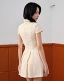 Đầm mini xếp ly phối nút gold